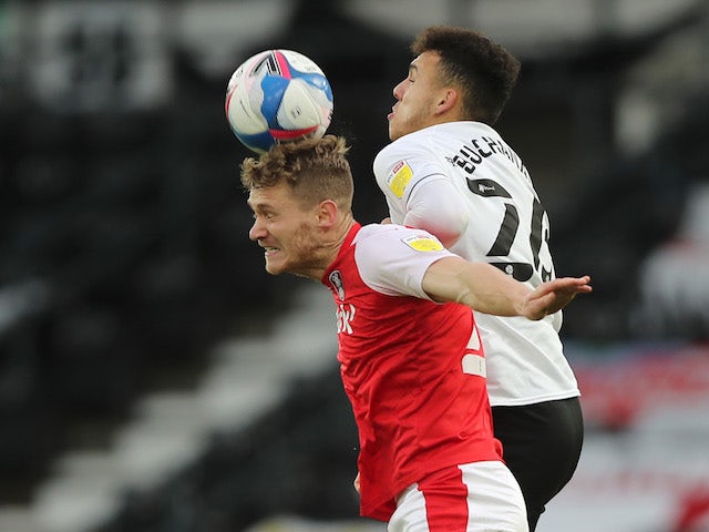 Rotherham United's Michael Smith in action with Derby County's Lee Buchanan on January 16, 2021