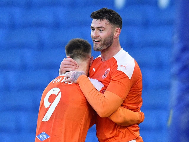 Blackpool's Gary Madine celebrates scoring their first goal with Jerry Yates on January 23, 2021