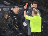 Aston Villa manager Dean Smith is shown a red card on January 20, 2021
