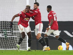 Pogba hits stunner as Man United return to summit with win at Fulham