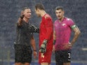 Moreirense players including Mateus Pasinato speak to the referee in January 2021