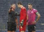 Moreirense players including Mateus Pasinato speak to the referee in January 2021