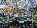 Sporting Lisbon players celebrate winning the Taca da Liga with the trophy on January 23, 2021