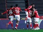 Famara Diedhiou celebrates scoring for Bristol City against Huddersfield Town in the Championship on January 26, 2021