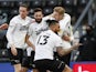 Derby County's Colin Kazim-Richards celebrates scoring their first goal with teammates on January 30, 2021