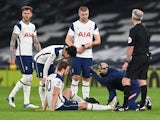 Tottenham Hotspur striker Harry Kane receives treatment for an injury suffered in January 2021
