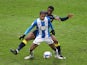 Huddersfield Town's Juninho Bacuna in action with Stoke City's John Obi Mikel on January 30, 2021