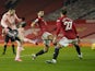 Sheffield United's Oliver Burke scores against Manchester United in the Premier League on January 27, 2021