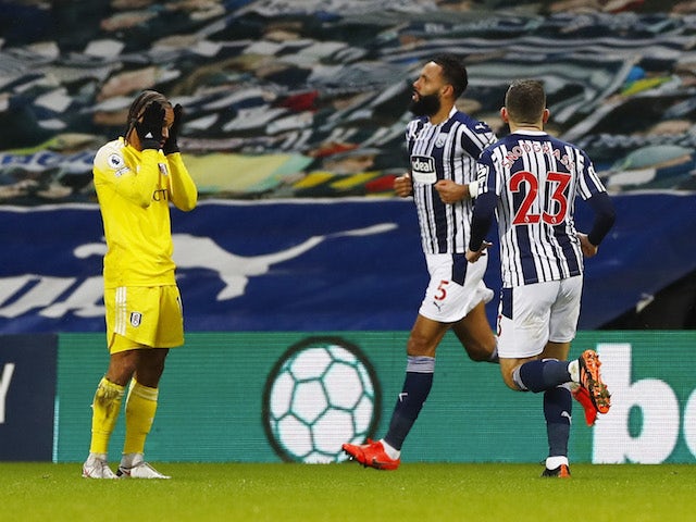 West Bromwich Albion's Kyle Bartley celebrates scoring their first goal against Fulham with teammates on January 30, 2021