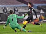 Liverpool's Mohamed Salah scores against West Ham United in the Premier League on January 31, 2021