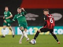  Bournemouth's Chris Mepham in action with Sheffield Wednesday's Callum Paterson in the Championship on February 2, 2021