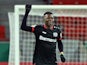 Bayer Leverkusen's Edmond Tapsoba celebrates scoring in January 2021