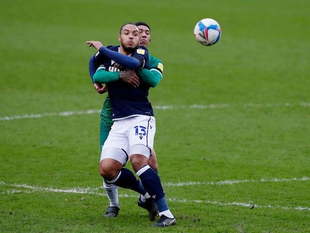 Millwall's Kenneth Zohore in action with Sheffield Wednesday's Liam Palmer on February 6, 2021