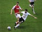 Rotherham United's Michael Smith in action with Derby County's Graeme Shinnie in the Championship on February 3, 2021