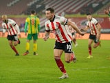 Billy Sharp celebrates scoring for Sheffield United against West Bromwich Albion in the Premier League on February 2, 2021