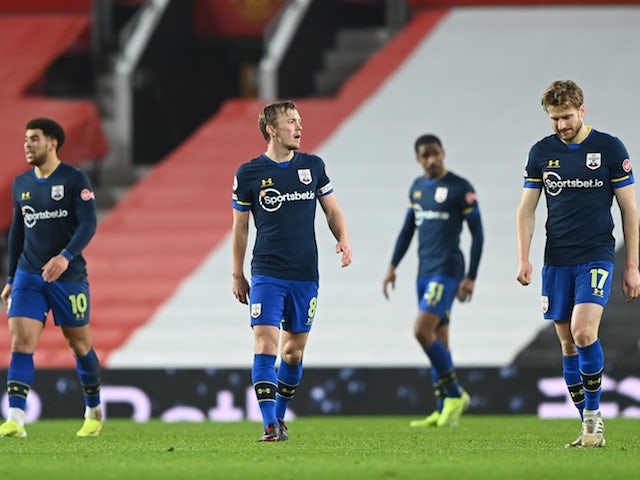 Southampton players look dejected during their 9-0 defeat to Manchester United in February 2021