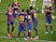 Barcelona's Lionel Messi celebrates scoring their second goal with teammates on February 13, 2021