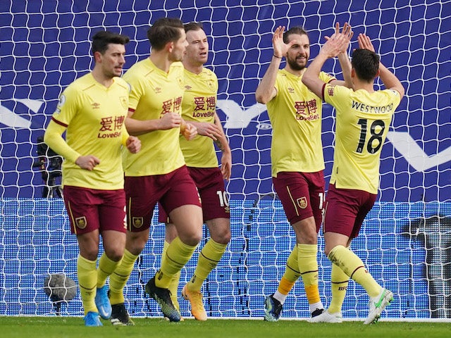 Burnley's Jay Rodriguez celebrates scoring their second goal with Ashley Westwood and teammates on February 13, 2021