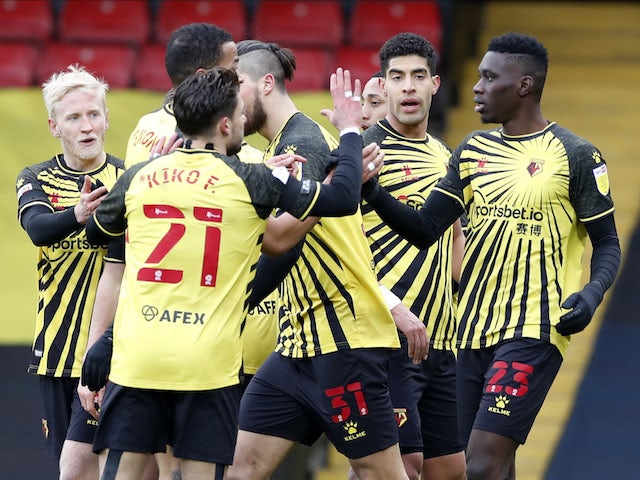 Watford's Ismaila Sarr celebrates scoring their second goal with teammates on February 13, 2021
