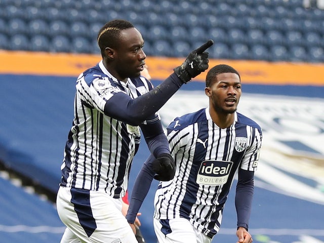 West Bromwich Albion's Mbaye Diagne celebrates scoring against Manchester United in the Premier League on February 14, 2021