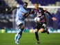 Coventry City's Julien Dacosta in action with Norwich City's Dimitris Giannoulus in the Championship on February 17, 2021
