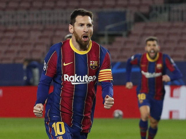 Barcelona's Lionel Messi celebrates scoring their first goal on February 16, 2021