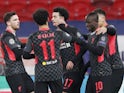 Liverpool's Sadio Mane celebrates scoring their second goal with teammates on February 16, 2021