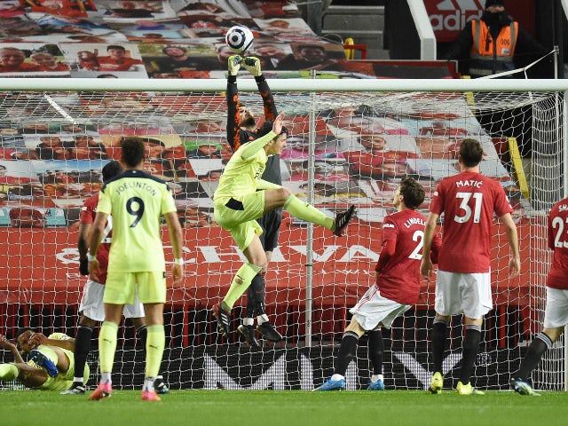 Manchester United's David De Gea saves an effort from Newcastle United's Joelinton in the Premier League on February 21, 2021