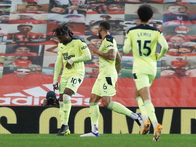 Newcastle United's Allan Saint-Maximin celebrates scoring their first goal against Manchester United on February 21, 2021