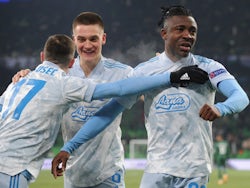 Dinamo Zagreb's Iyayi Atiemwen celebrates scoring their third goal with teammates in the Europa League on February 18, 2021
