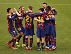 Barcelona's Ousmane Dembele celebrates scoring their first goal with teammates on February 27, 2021