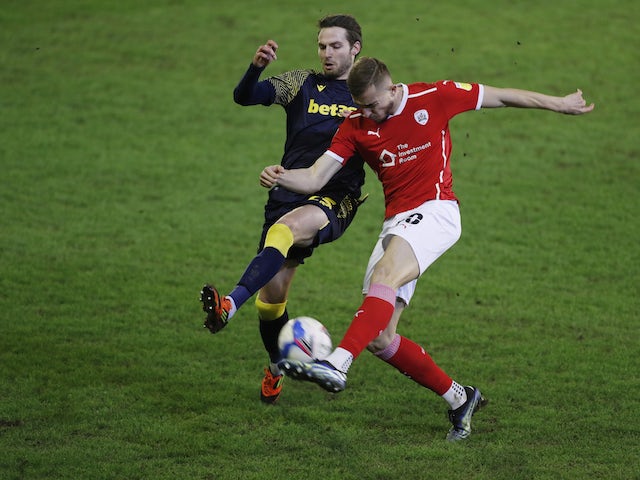 Barnsley's Michal Helik in action with Stoke City's Nick Powell in the Championship on February 24, 2021