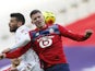 Lille's Sven Botman in action with AS Monaco's Kevin Volland in Ligue 1 on December 6, 2020