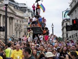 Revellers take over on Piccadilly Circus for London Pride 2019