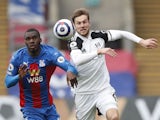 Crystal Palace's Christian Benteke in action with Fulham's Joachim Andersen in the Premier League on February 28, 2021