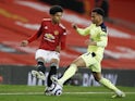 Manchester United's Shola Shoretire in action with Newcastle United's Jacob Murphy in the Premier League on February 21, 2021