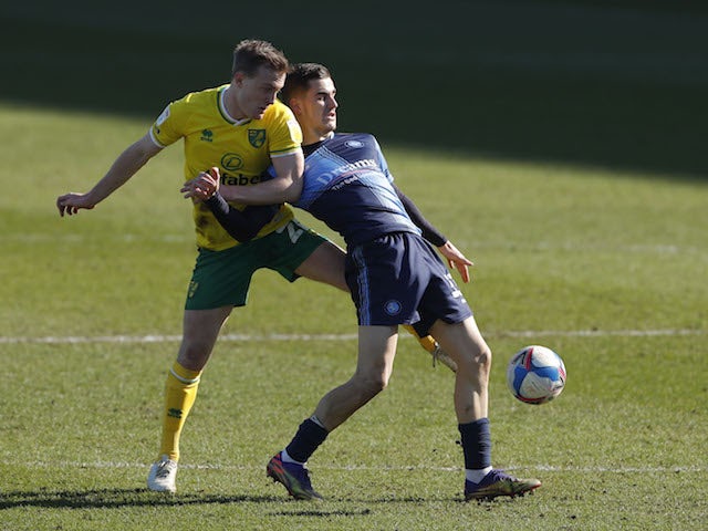 Norwich City's Oliver Skipp in action with Wycombe Wanderers' Anis Mehmeti in the Championship on February 28, 2021