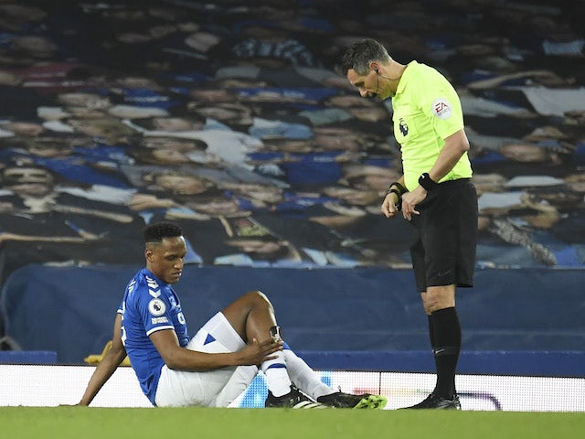 Yerry Mina reacts after sustaining an injury in February 2021