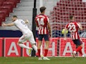 Real Madrid's Karim Benzema celebrates scoring against Atletico Madrid in La Liga on March 7, 2021