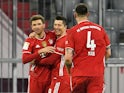 Robert Lewandowski celebrates scoring for Bayern Munich against Borussia Dortmund in the Bundesliga on March 6, 2021