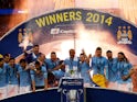 Manchester City celebrate winning the EFL Cup in March 2014