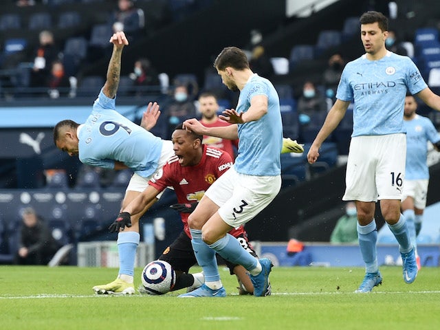 Manchester City's Gabriel Jesus fouls Manchester United's Anthony Martial in the Premier League on March 7, 2021
