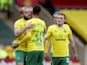 Norwich City's Teemu Pukki celebrates scoring their second goal with teammates on March 6, 2021