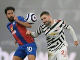 Manchester United's Luke Shaw in action with Crystal Palace's Andros Townsend in the Premier League on March 3, 2021