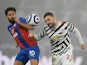 Manchester United's Luke Shaw in action with Crystal Palace's Andros Townsend in the Premier League on March 3, 2021
