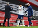 Tottenham Hotspur's Son Heung-min goes off injured against Arsenal in the Premier League on March 14, 2021