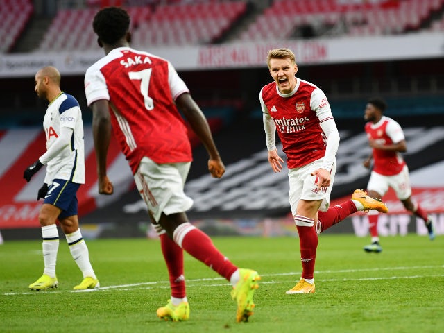 Martin Odegaard celebrates scoring for Arsenal against Tottenham Hotspur in the Premier League on March 14, 2021