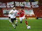 Derby County's Graeme Shinnie in action with Barnsley's Romal Palmer in the Championship on March 10, 2020