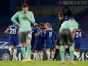 Chelsea celebrate a Ben Godfrey own goal against Everton in the Premier League on March 8, 2021