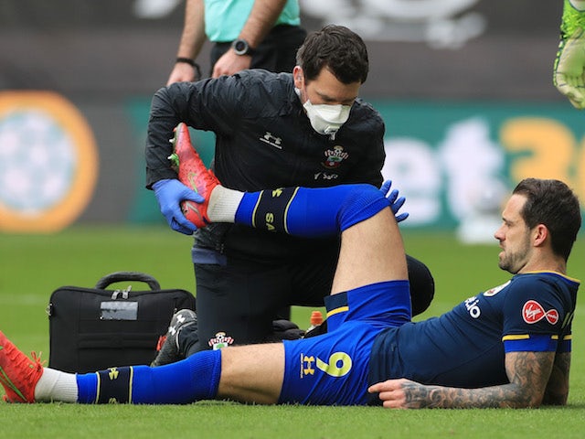 Southampton striker Danny Ings receives treatment for a muscle injury in March 2021